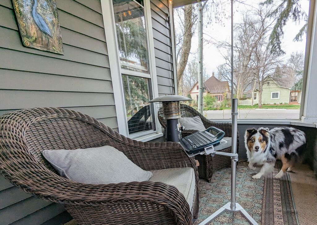 Magic hold laptop stand + AlphaSmart3000 set up for writing on my screened-in porch (Bowie dog sold separately)